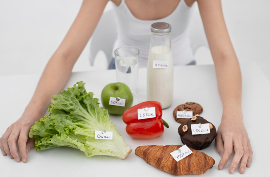 Foods labeled with calorie values illustrating the science behind metabolism