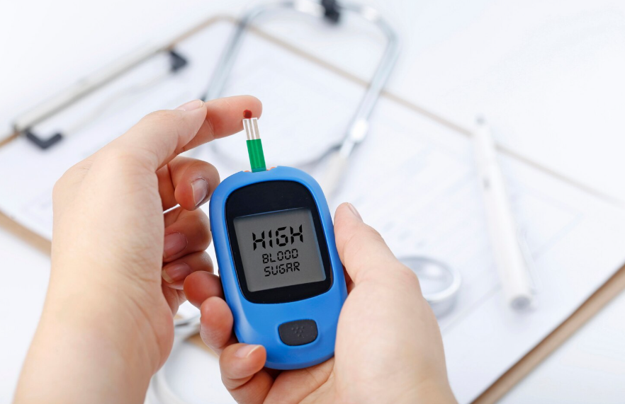 blood glucose meter showing high blood sugar illustrating what is insulin resistance